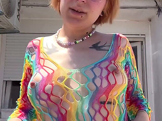Smoking in a Rainbow Fishnet on the Balcony
