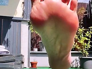 Outdoor solo scene with Ivana masturbating her pussy