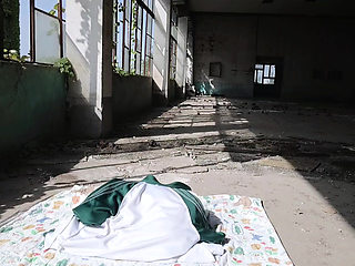 Cute Asian boy masturbates, moaning, ejaculating, and swallowing semen in a sunlit abandoned factory