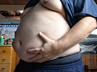 Chubby guy strips and dances