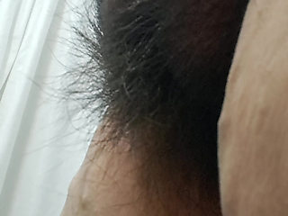 Mom's mature pussy is fat and hairy, perfect for fucking.