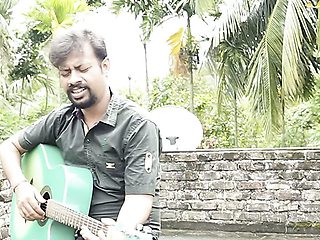 DESI COUPLE SINGING WITH GUITER IN ROOF (OUTDOOR)