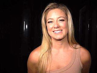 Blonde tested in a bondage room with suspension equipment
