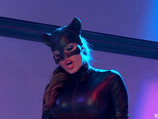 Leather-clad dominatrix with a stunning body getting her pussy licked
