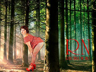 Pin-up lady posing in the forest. She shows her tits and pussy. Mesh tights. Special effect.