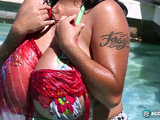 Sexy ebony babe with huge tits enjoys a steamy solo session in the pool