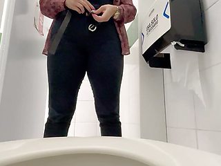 Secretary trapped in public bathroom pissing