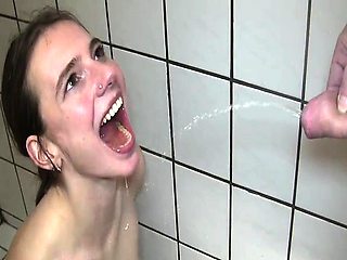 Fisting and pissing on insatiable teen slut