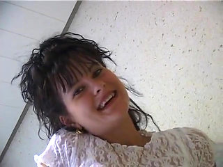 Small titted brunette babe is rubbing her hairy snatch