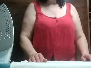 Stepmom, 57 Years Old, with Big Natural Tits, Irons Clothes and Has a Secret Video Call with Her Stepson