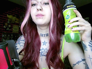 Sexy Alternative Redhead Drinking Soda and Burping