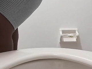 Desperate for a Pee Holding as Long as I Can Pissing in the Toilet