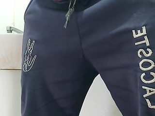 A Well-endowed Brazilian Man Urinating and Showing His Thick Penis to His Female Friends.