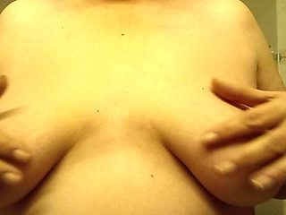 Feminine MILF breasts in close-up - mature curves, present nipples & pure closeness 50+