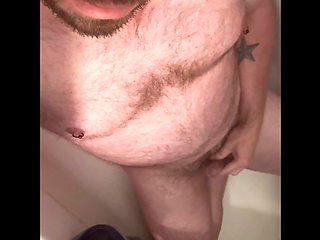 Compilation: Uncut gay bear gives himself a golden shower all over his hairy chest and belly