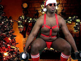 Sexy black Santa works out before jerking his big stocking stuffer