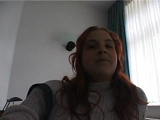 Hairy redhead bbw fingers her pussy on the bed