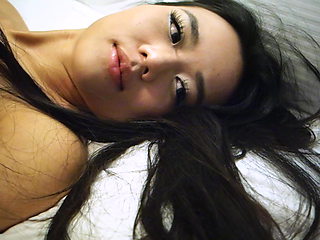 Asian adult model Estelle Lela Angels playes in bed