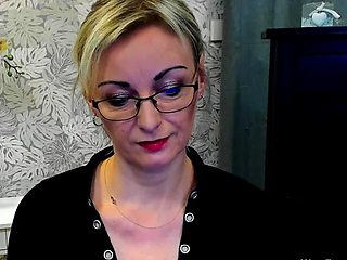 Blonde MILF takes off bra on webcam