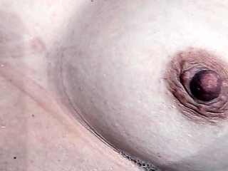 My pointing in the hot tub with the waterfall