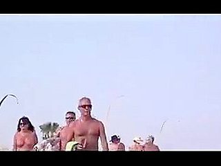 French nudist beach Cap d&#039;Agde people walking in nature&#039;s garb 02