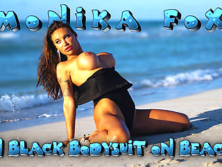 Sexy Monika Fox in Black Bodysuit on Beach