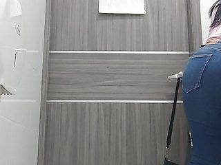 Amateur camera of girl pissing in public toilet
