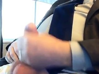 Suited Silver Fox Jerks Off Solo