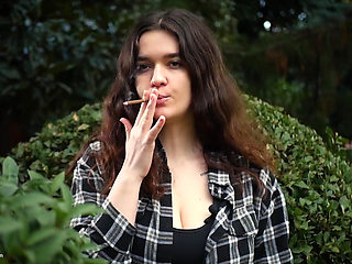 Sweet and Busty Russian Babe Smoking Cigarette in Nature