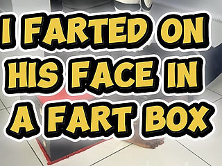 African Mistress Farts on His Face in a Fart Box
