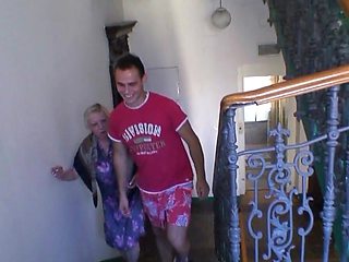 Older blonde woman is riding the huge dick of a younger man