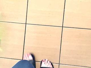 Feet in Flip-flops and Walking in Flip-flops
