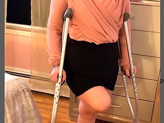 Sexy blonde amputee Bionic Beauty heels and crutches