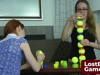Two lesbians in an intimate Strip Ball Stacks challenge