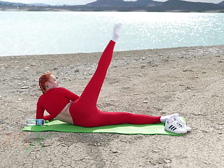 Doing Yoga Stretching Nerby Beautiful Lake