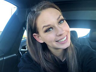 Long-haired beauty indulges in solo car ride