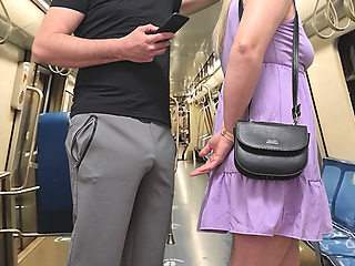 Watching how my wife is touched in public. She stroke stranger's erection on crowded subway