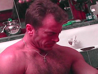 Seductive Brunette in the Bathroom: Passionate Oral Delight