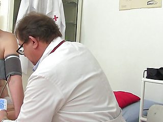 Mature Gyno- pervert gyno doctor operates a cam in his surgery to record patient