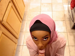 Cute ebony is wearing a hijab and feasting on a BWC