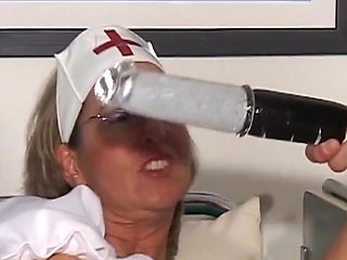 Mature Nurse Spreads Wide for Intense Toy Play While Sucking