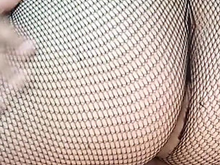 Chubby Girl in Fishnet Stockings Riding