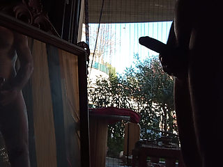 Nice and risky in the mirror on the side of the road