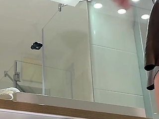 Miniskirt Lover Raver Girl Reveals Her Piercing on Her Pussy in the Bathroom by Lifting Her Short Skirt