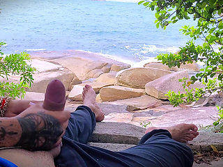 Handjob surprise ejaculation on the beach