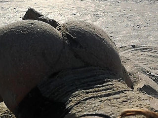 Hot babe teasing on the beach