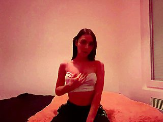 Brunette amateur babe strips off and masturbates