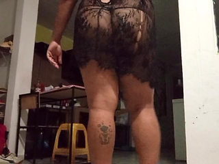Chubby Mexican milf shows her ass in the kitchen