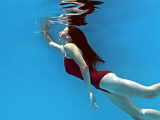 Hot mixed race teen Fernanda Releve swimming naked