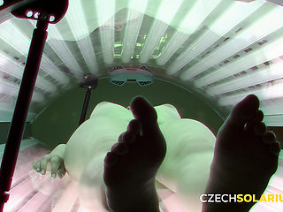 Czech Solarium 26: Brunette Sunbathes and Exposes Her Tight Pussy